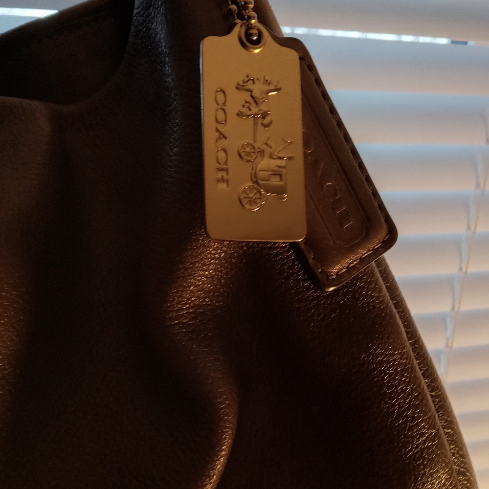 Woman's Leather Coach Bag, like New, light brown